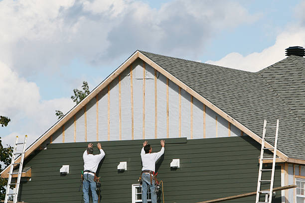 Professional Siding Installation technician working in Poplar Branch, NC